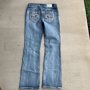 Women’s Miss Me Jeans, size 29x34.  Mid-rise, Boot Cut.  Perfect Condition.